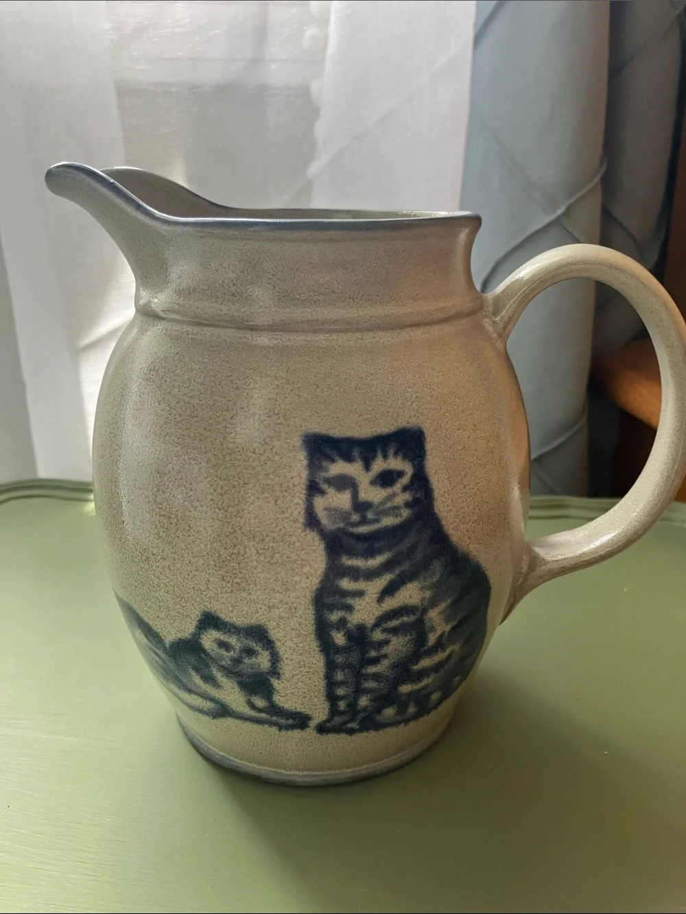 Stoneware type 6” pitcher with blue cat design